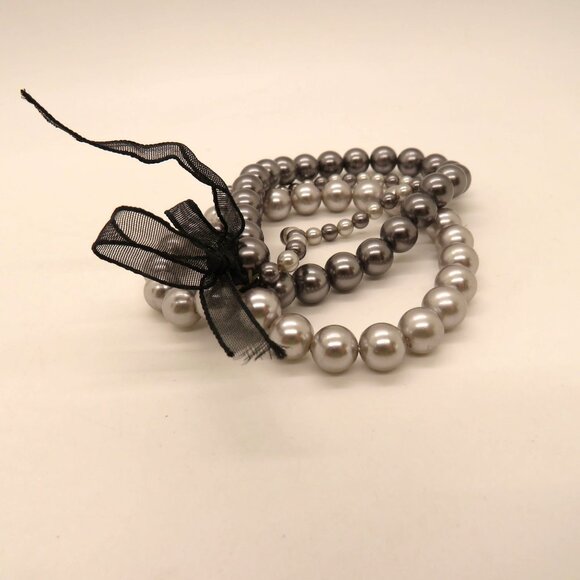 Roman RMN Bracelet Silver Gray Imitation Pearl Bead Stretch Black Bow Accent - Picture 1 of 10